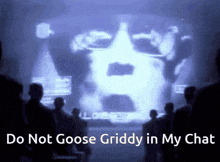 a group of people looking at a screen with the words do not goose griddy in my chat