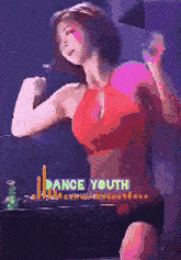 a woman in a red top is dancing in front of a dance youth sign