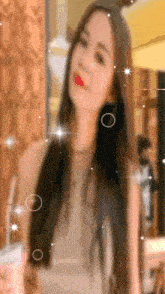 a blurry picture of a woman with long hair and red lipstick
