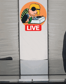 a sign that says live on it with a cartoon of a boy playing a record
