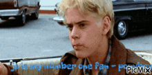 a picture of a man in a car with the words " it is my number one fan " on the bottom