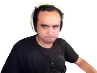 the man is wearing headphones and a black shirt