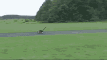 flying lawnmower gorilla gif