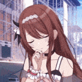 a girl with long brown hair is wearing a choker and a tiara .