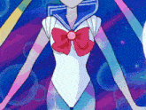 a woman in a sailor suit has a red bow on her top