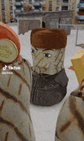 a tiktok video of a cartoon character with a hat on his head