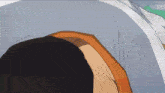 a close up of a person 's head with a white shirt on .
