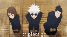 three anime characters are kneeling on the floor and the words triplets gc are visible