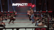a wrestling ring with a sign that says impact20