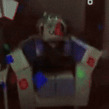 a blurred image of a robot with the number 3 on it 's head