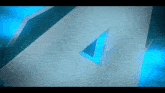 a white triangle with a blue triangle in the middle of it