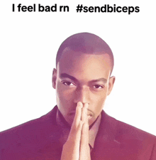 a man in a suit with his hands folded and the words i feel bad rn #sendbiceps above him