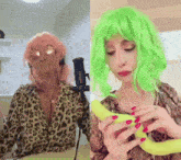 a woman in a pink wig and green wig holds a banana