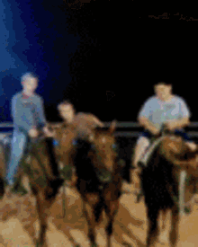 a group of people are riding horses in a blurred image