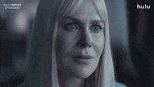a close up of a woman 's face with the word yes on it