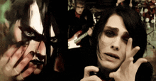 a man playing a guitar next to a woman with a mask on