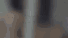a blurred image of a person with the words we are away from home human phat