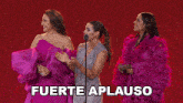 three women standing next to each other with the words para los gandores written on the bottom