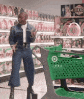 a woman is standing in front of a target shopping cart