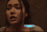 a woman 's face is shown with the words " do n't move " visible