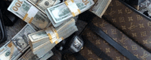 louis vuitton wallets and stacks of money