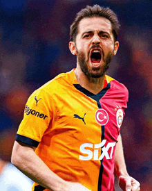 a soccer player wearing a yellow and red jersey with sixt on it