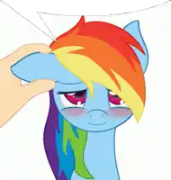 a rainbow dash pony is being petted by a hand