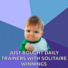 a baby with a fist in the air with the words just bought daily trainers with solitaire winnings