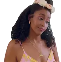 a woman wearing a flower crown on her head