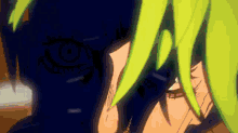 a close up of a person with green hair