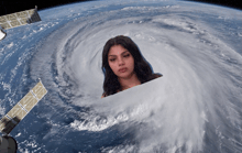 a picture of a woman in a hurricane
