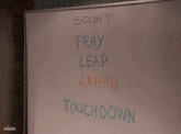 a white board with squat pray leap and touchdown written on it