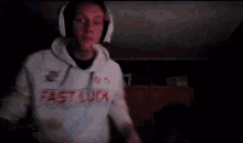 a blurry image of a person wearing headphones
