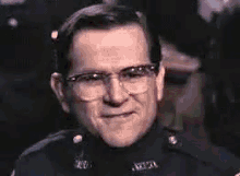 Police Academy Police Officer GIF - Police Academy Police Officer Smile GIFs
