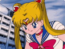 a close up of a cartoon character with a red bow on her chest
