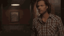 a man with the name jared padalecki on the bottom