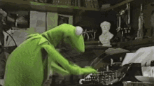 the muppet kermit the frog type typing typewriter