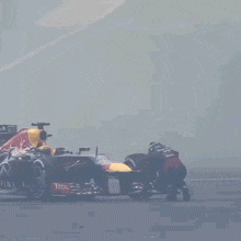 a red bull race car with the number 33 on the side