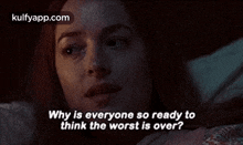 a woman is laying in bed with the words `` why is everyone so ready to think the worst is over ? ''
