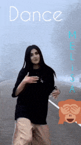 a woman is dancing in front of a sign that says dance on it