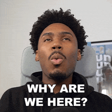 a man making a funny face with the words why are we here