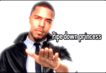 a man in a suit and tie is pointing at the camera with the words pipe down princess below him