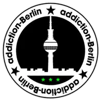 a logo for addiction berlin with a tower in the center