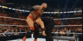 Roman Reigns Superman Punch Batista Extreme Rules GIF - Roman Reigns Superman Punch Batista Extreme Rules GIFs