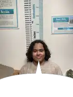 a man is standing in front of a ruler that says centimeters on it