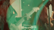 Strumming The Guitar Born Without Bones GIF - Strumming The Guitar Born Without Bones Disappearer Song GIFs