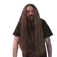 a man with long hair and a beard wears a black shirt that says evil