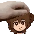 a person is petting a cartoon character 's head with a towel .