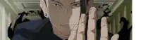 a close up of a person 's face with their fingers in front of it