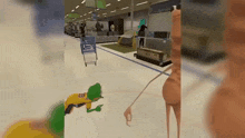 a cartoon character is playing a video game in a store with a shopping cart and a frog .